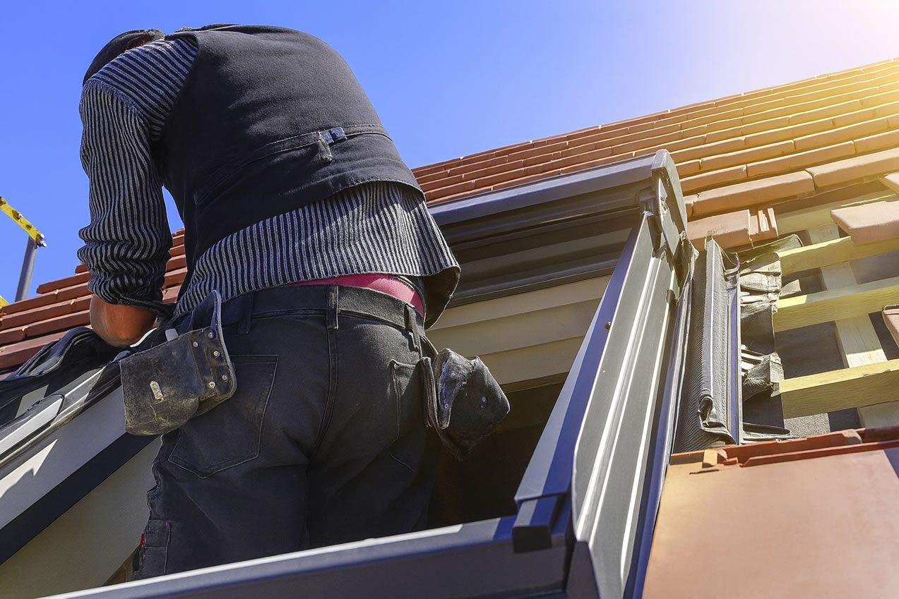 Roof window repairs by a professional roofer